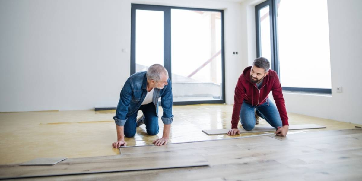 men installing duchateau floors