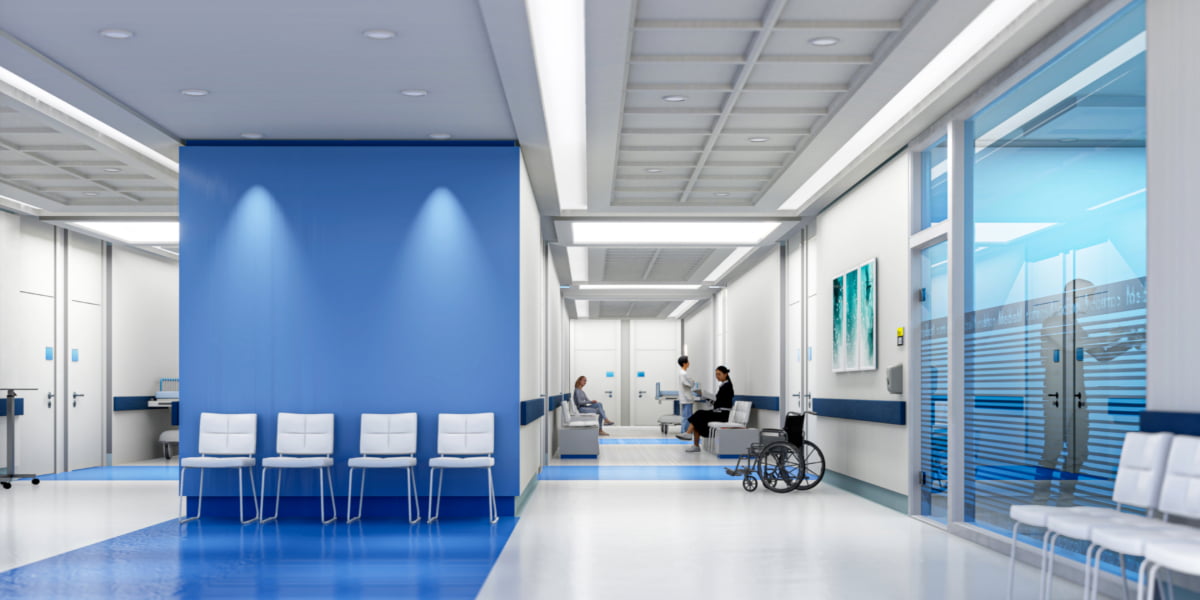 Modern waiting area and hallway with commercial hospital flooring designed for safety, durability, and hygiene in a healthcare facility