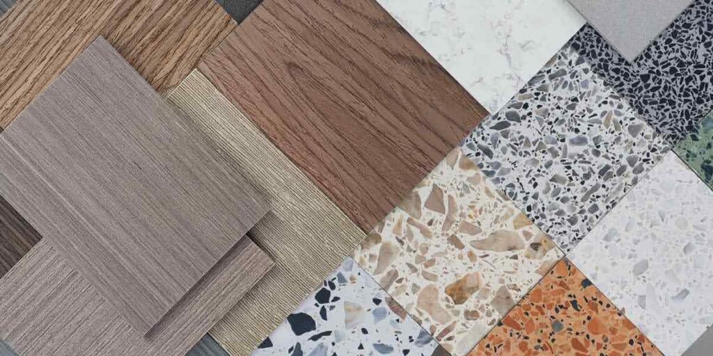 Various material samples representing Commercial Mix-Use Flooring Style, including wood, terrazzo, and textured finishes for commercial design.