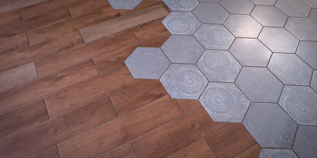 Seamlessly blended transition from wood to tile flooring in a residential home.