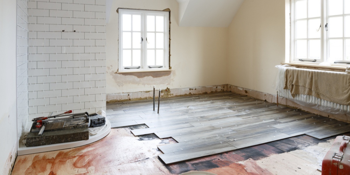 A home is getting a flooring remodel with new vinyl flooring.