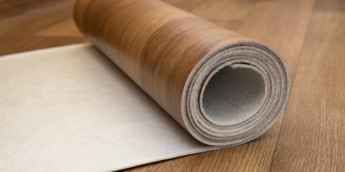 Rolled sheet flooring sample used to compare Linoleum vs Laminate Flooring for commercial interiors